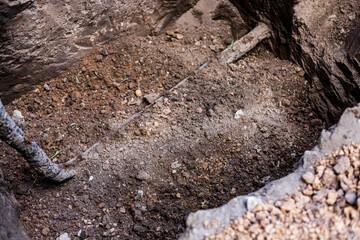 Gas pipe in the ground. Entering the house.