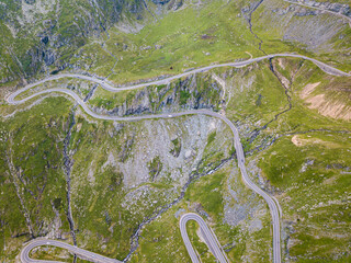 Transfagarasan road is one of the most spectacular mountain roads in the world. Beautiful long and curvy road viewed from a drone.