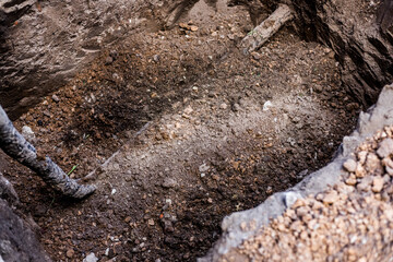 Gas pipe in the ground. Entering the house.