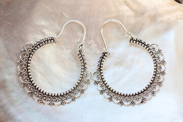 Lovely female Metal earrings in oriental shape