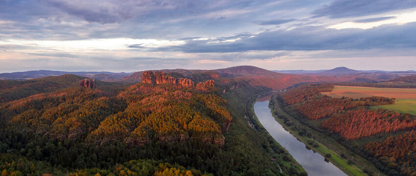 Luftaufnahme von den Schrammsteinen mit Falkenstein in der S&auml;chsischen Schweiz zum Sonnenuntergang / Aerial view of Schrammsteine with Falkenstein rock in Saxonian Switzerland at Sunset