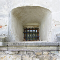 window in a stone wall