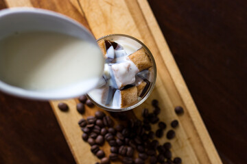 cup glass with coffee and milk cream