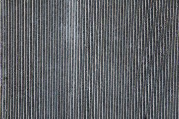 grey concrete wall background with striped texture