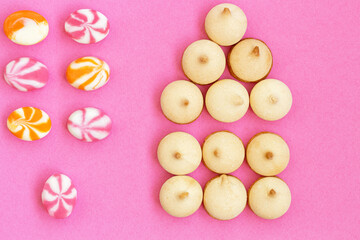 Lots of sweeties on pink background. Celebrations at home. Creative summer flat lay
