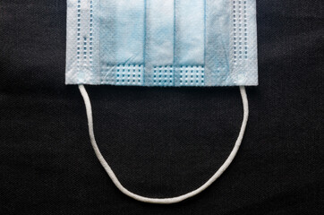 Background concept for news about the novel coronavirus COVID-19 pandemic, antiviral medical mask...