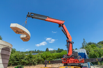 crane with counterweight under blue sky