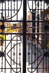 latticed entrance gate to a village cemetery