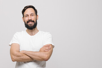 happy young man in the studio on a white background