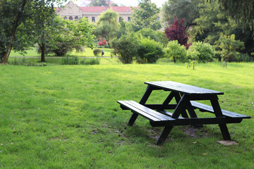 Bench with a table in the palace garden