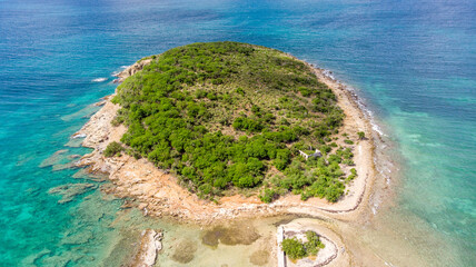 Aerial view of an empty small island in the caribbean.