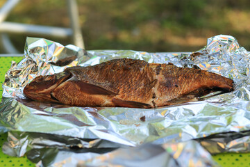 Fish bream cooked hot smoked in nature