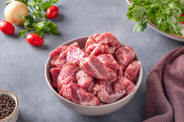 Marinated pork meat ready to cook on skewers. Pork meat with spices