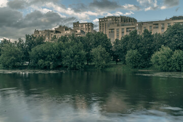 Fototapeta premium Expensive modern residential complex on the shore of a reservoir