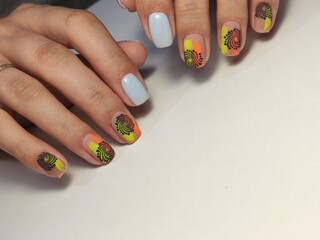 Beautiful nail design on female hands on background.