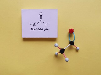 Structural chemical formula and molecular structure model of acetaldehyde molecule. Acetaldehyde...