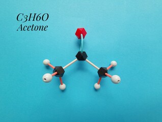 Molecular structure model and chemical formula of acetone molecule. Acetone (propanone) is the...