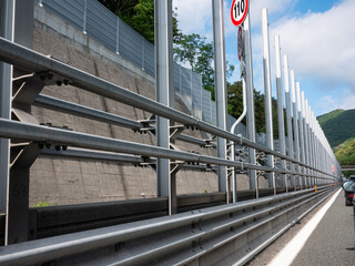 metal structures on the highway : Guard rail and  poles