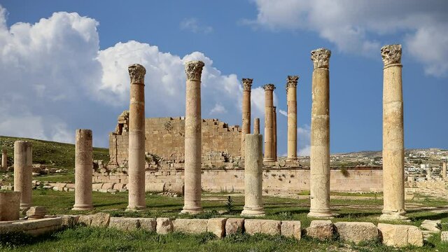 Roman ruins in the Jordanian city of Jerash (Gerasa of Antiquity), capital and largest city of Jerash Governorate, against the background of moving clouds, Jordan  