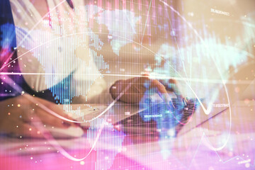 Multi exposure of woman hands typing on computer and business theme hologram drawing. Success concept.