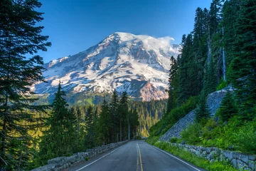  Mt Ranier and park road in Mt Ranier National Park, Washington. Glaciers and snow are visible. © Bob