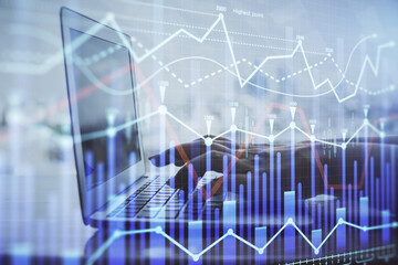 Double exposure of woman hands typing on computer and forex chart hologram drawing. Stock market analysis concept.