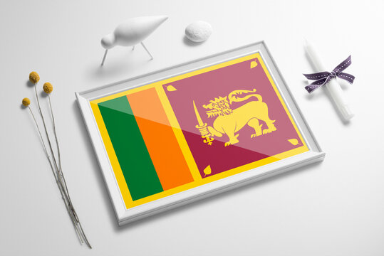 Sri Lanka flag in wooden frame on table. White natural soft concept, national celebration theme.