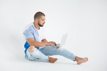 young man with laptop computer