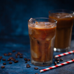 Cold summer drink, coffee with milk, coffee beans, summer mood
