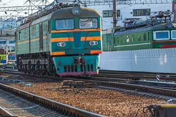 Fototapeta premium Train by the railway station
