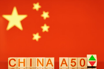 china a50. wooden blocks with the inscription china a50 on the background of the flag of china