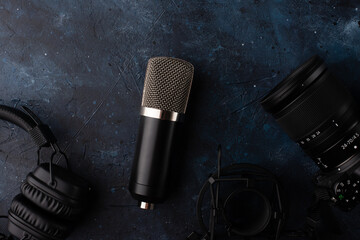 Studio microphone with headphones and camera, professional streamer, blogger with space.