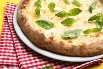Delicious hot cheese pizza on table, closeup