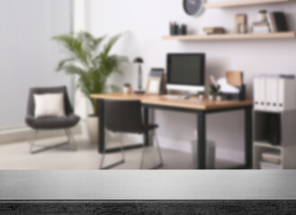 Empty stone surface and blurred view of modern office interior, closeup. Space for text