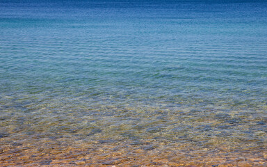 Shades of blue and green clear water in Lake Huron near Tobermory, Ontario, Canada