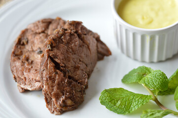 file mignon with mustard sauce
