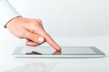 Close-up of a Businessman Using Tablet