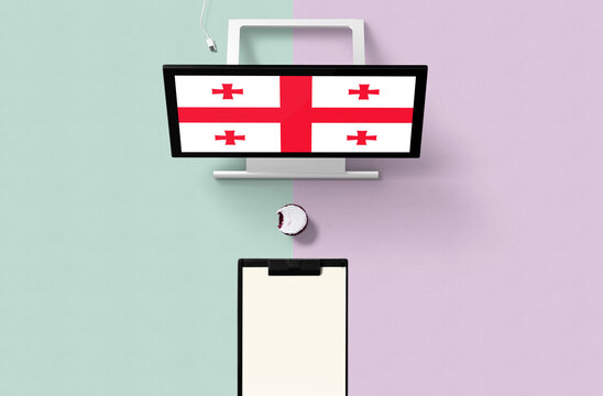 Georgia national flag on computer screen top view, cupcake and empty note paper for planning. Minimal concept with turquoise and purple background. - Powered by Adobe