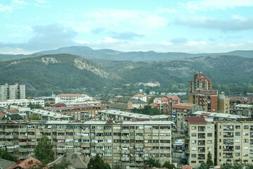 panorama of North Mitrovica, the serbian part of the town, with crumbling residential buildings, It is a symbol of the division between albanians and serbs in the city of Mitrovica