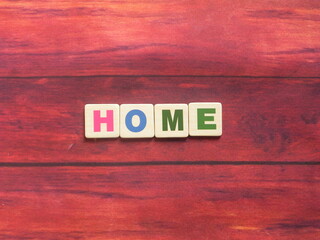 Word Home on wood background