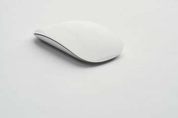 mouse on white surface, shiny plastic, technological element
