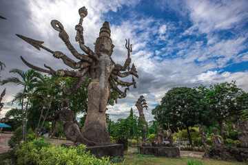 Fototapeta premium The background of the important religious sites in Nong Khai Province of Thailand (Sala Keo Kou) has Buddha images, statues, sculptures and history for tourists to study while traveling.