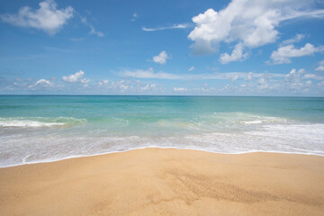 Fototapeta na wymiar tropical beach with blue sky and clouds