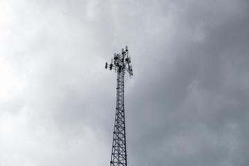 Telecommunication Tower in a Dark Cloudy Sy