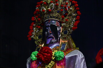 Fototapeta premium the Earth God parade. The Earth God is believed to protect villages and homes.