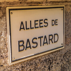 Street sign for Alley of the Bastard in Hautefort.