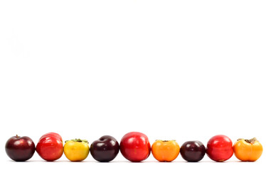 plums on white background