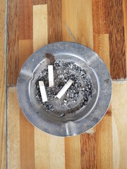 Ashtray With Ashes and Cigarettes