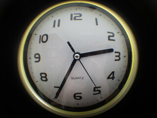 Wall clock isolated on black