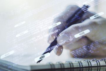 Double exposure of abstract creative programming illustration with world map and woman hand writing in notepad on background, big data and blockchain concept